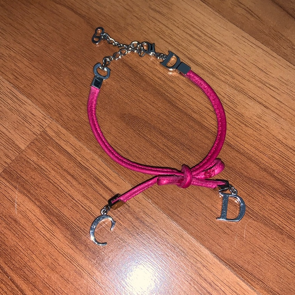 Authentic Christian Dior Leather and Metal Charm Bow Bracelet - Picture 1 of 11